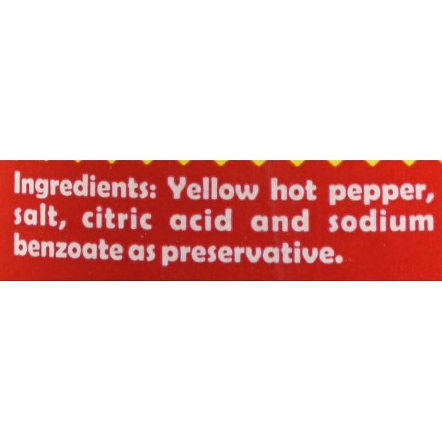 Inca's Food Aji Amarillo paste serving on a spoon adding heat.