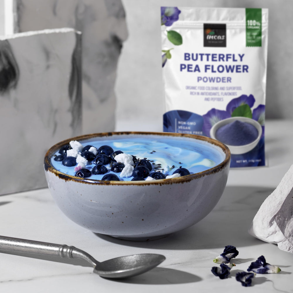 Incas Smoothie bowl with blue tones featuring butterfly pea powder.