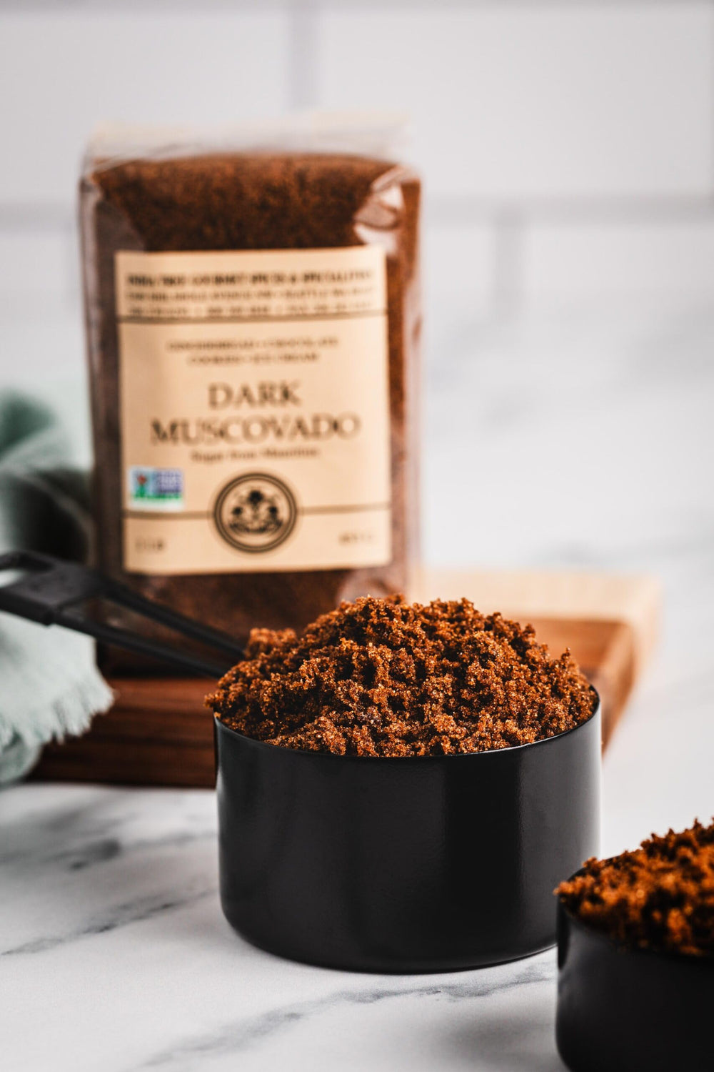 India Tree Dark Muscovado Sugar ready to blend into a mixing bowl for baking