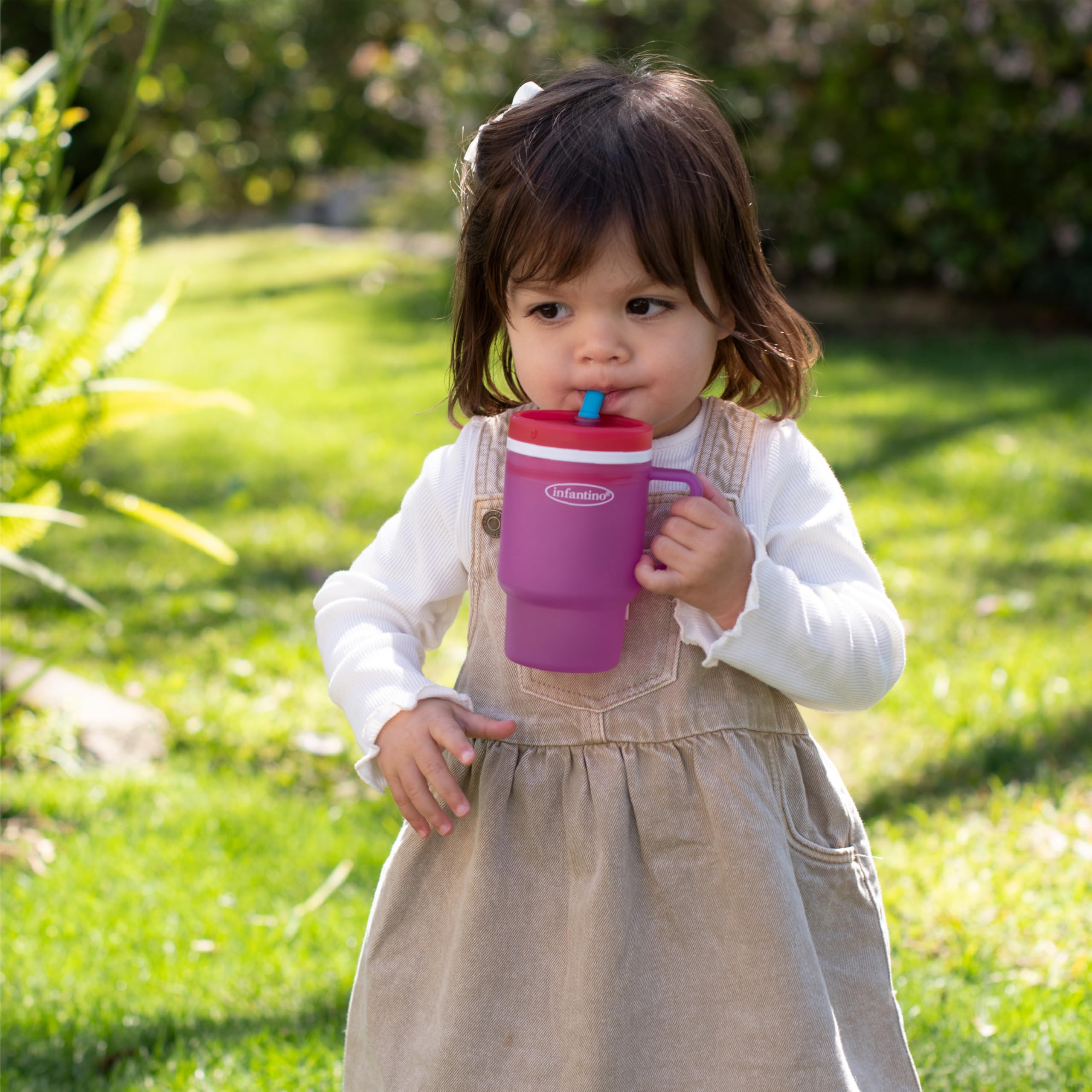 Infantino My 1st Tumbler being washed by hand demonstrates easy disassembly for parents.