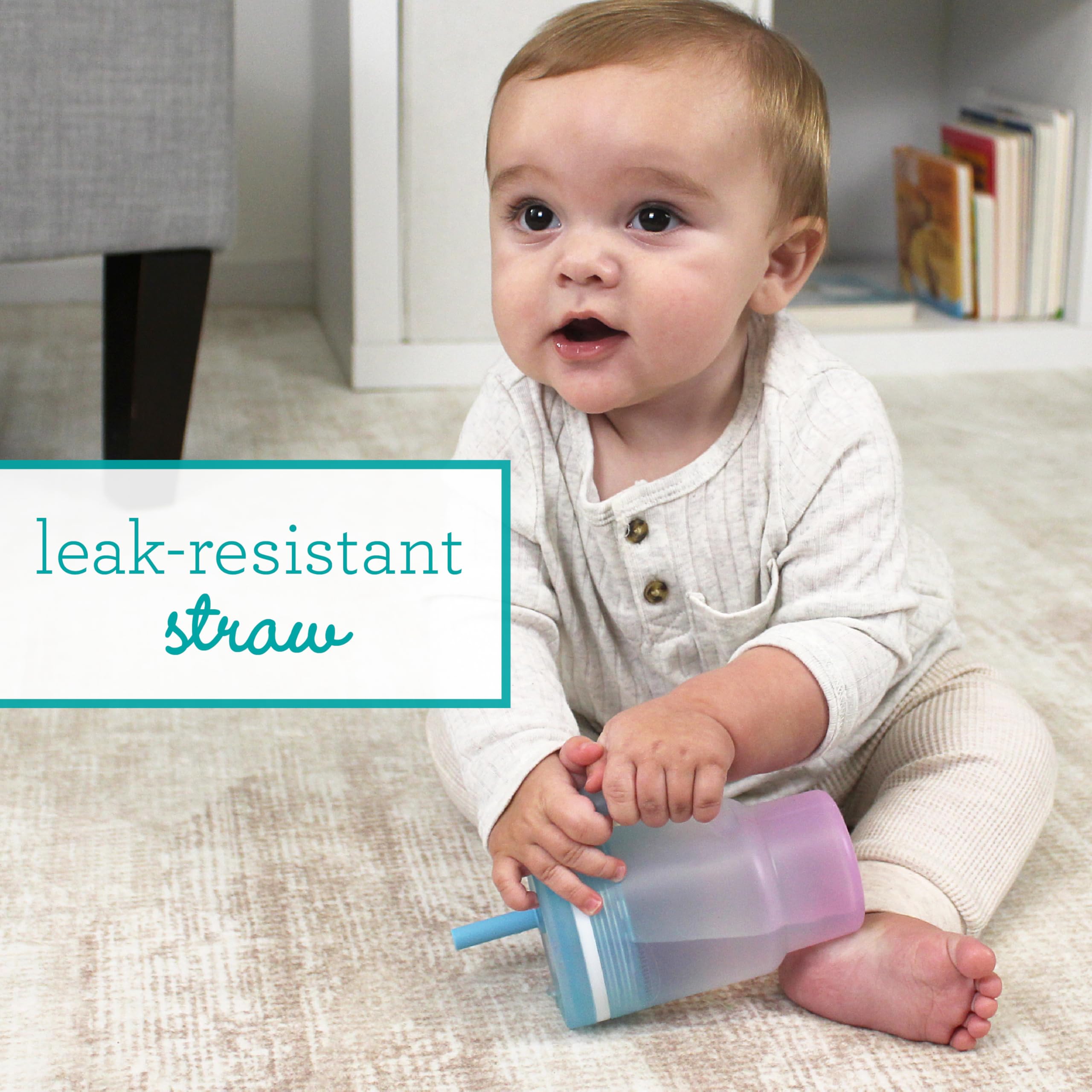 Infantino My 1st Tumbler easy-grip handle supports on-the-go sipping.