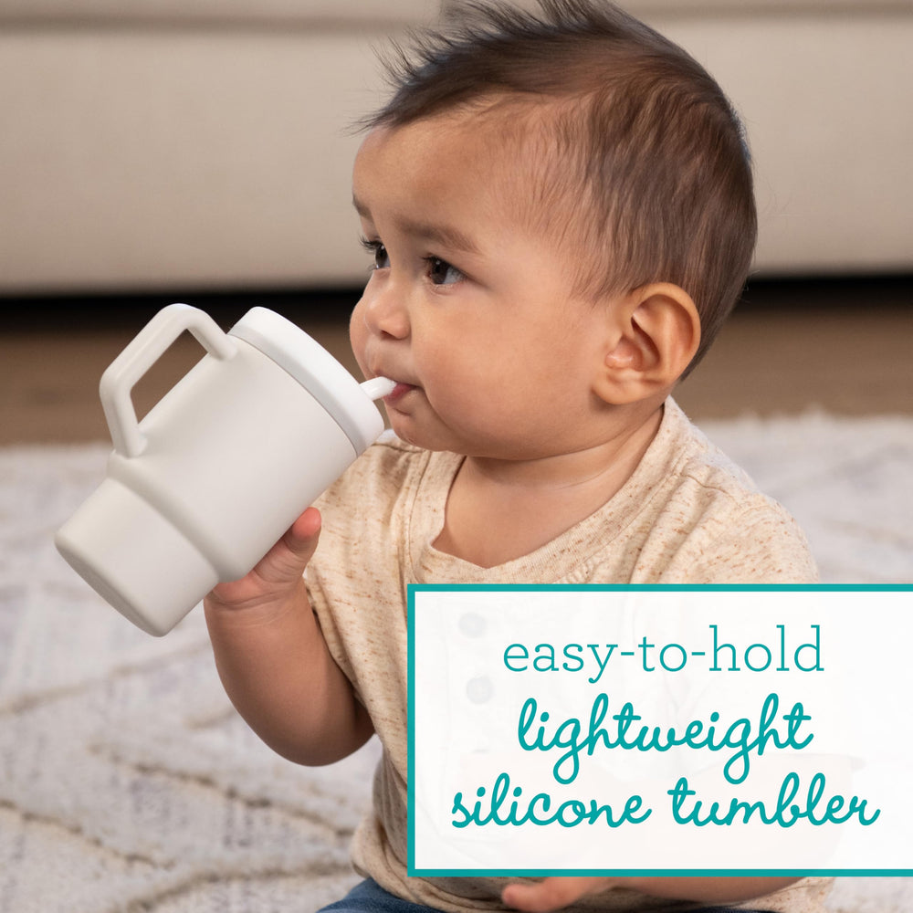 Infantino My 1st Tumbler silicone straw with valve reduces spills during play.