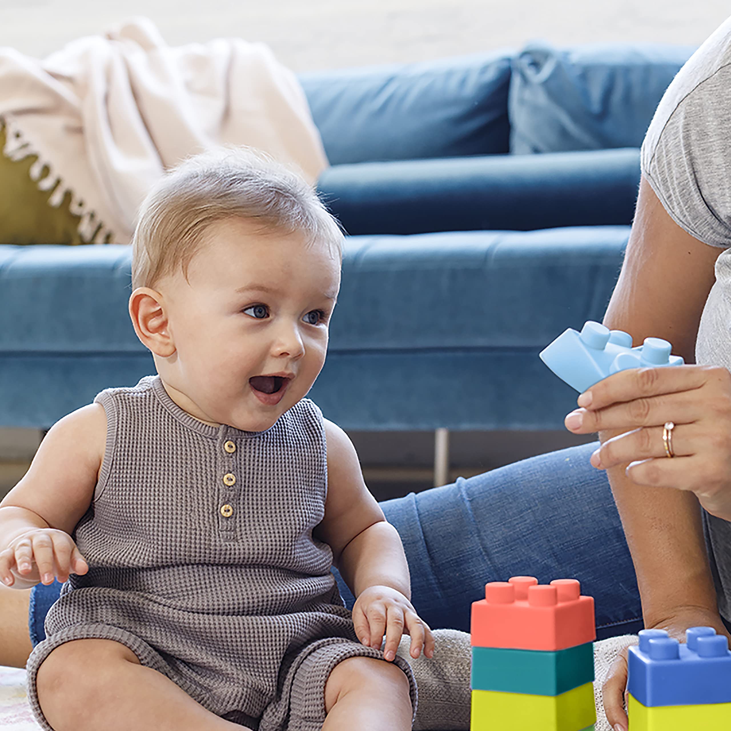 Infantino storage bag keeps blocks organized for quick cleanup and travel play.