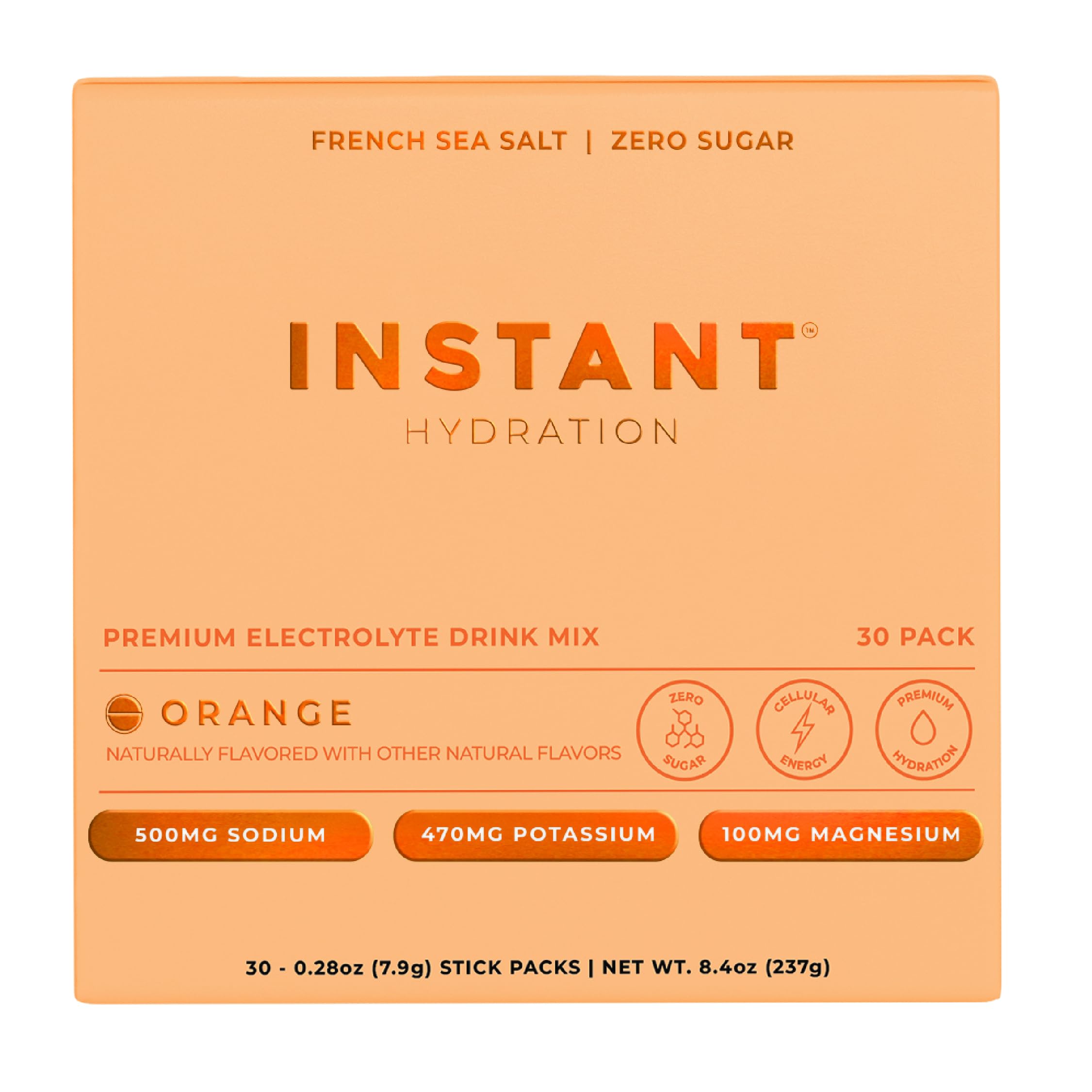 Instant Hydration orange packets poured into a glass for refreshing hydration.