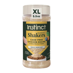 Instinct RawBoost Shakers bottle closeup highlighting cage-free chicken flavor.