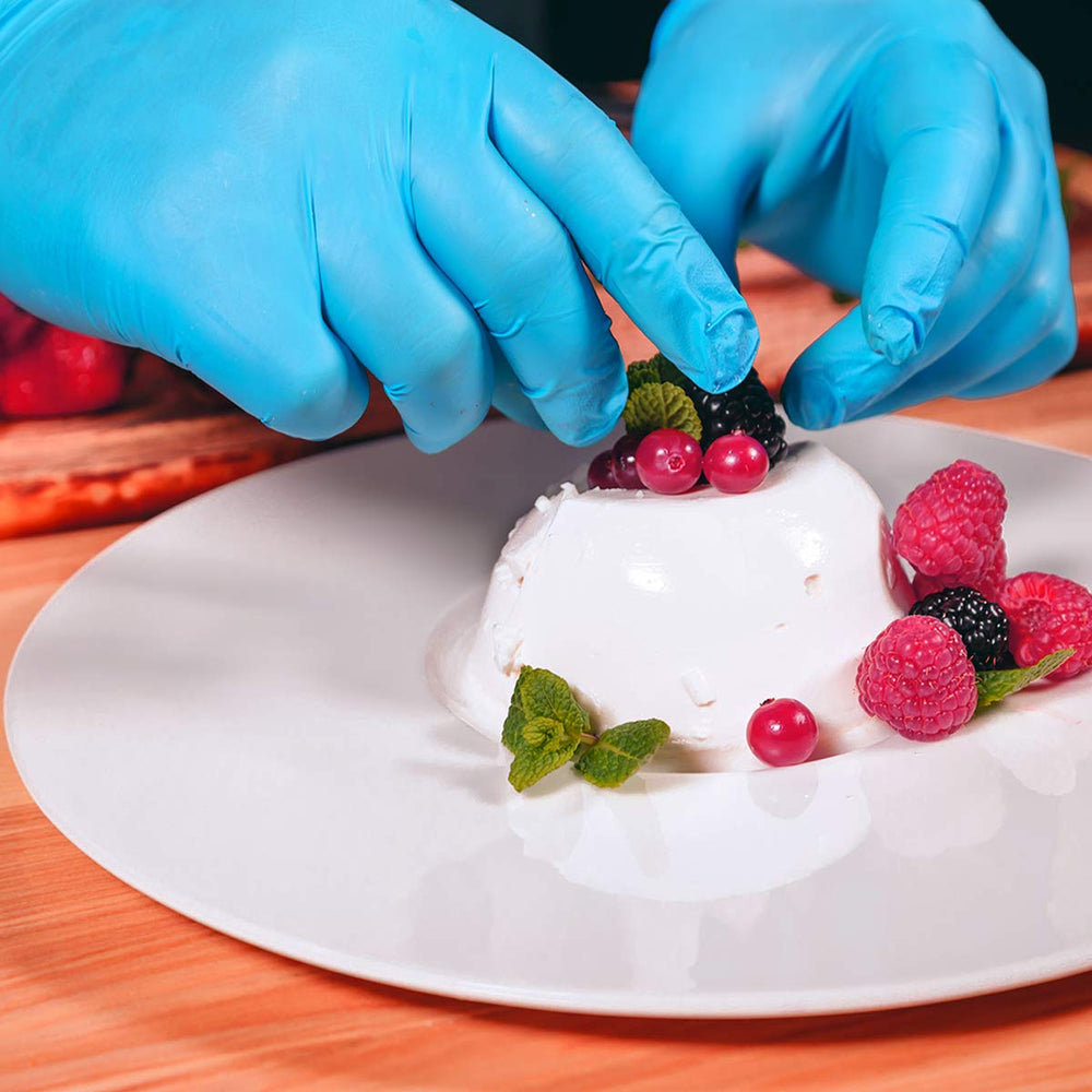 Intco Basic Medical blue nitrile gloves used for kitchen tasks.
