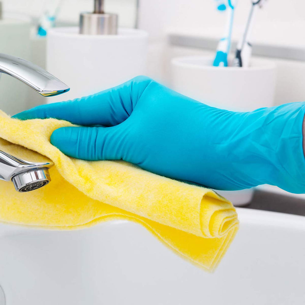 Intco blue nitrile gloves, smooth finish for enhanced tactile feedback during care.