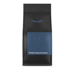 Intelligentsia Black Cat Analog espresso bag highlighting roast label and flavor notes.