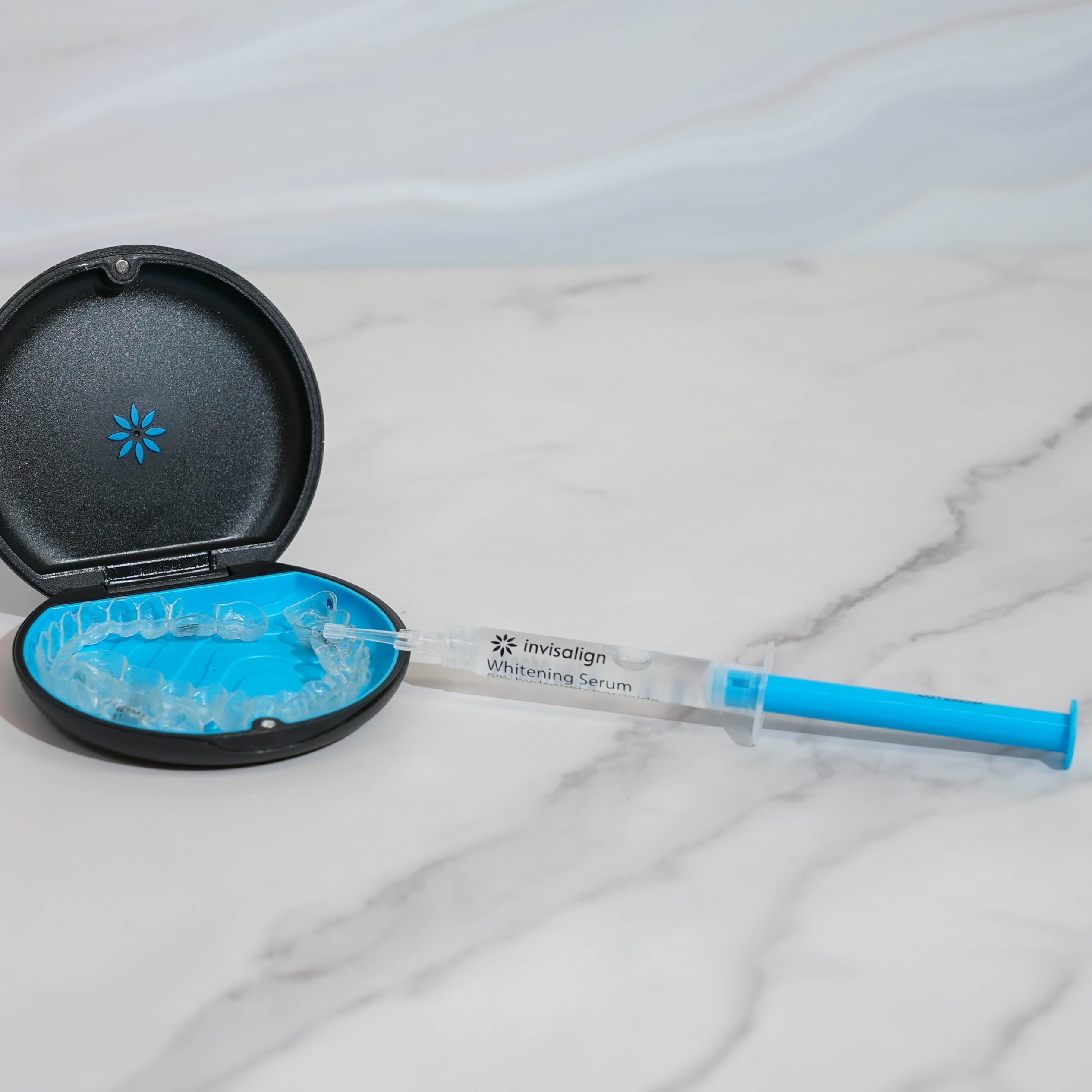 Invisalign accessory packaging shows tools to support your smile routine.
