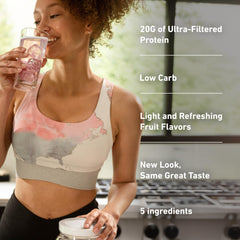 A glass of Isopure Clear Whey Isolate Tropical Punch demonstrates a refreshing, low-carb protein drink.