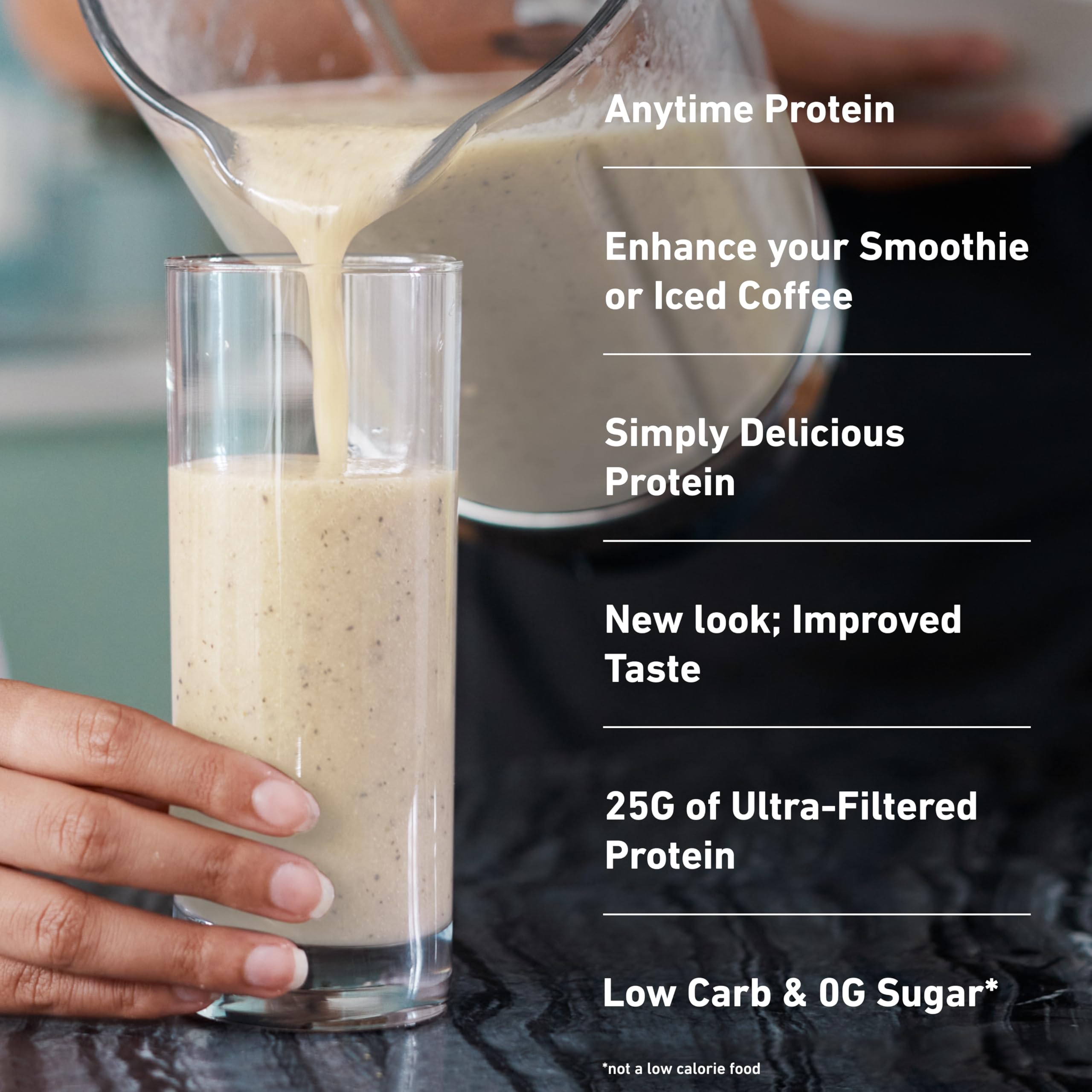 Isopure Toasted Coconut shake in glass showing creamy texture.