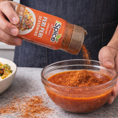 iSpice Peri Peri seasoning rubbed on vegetables for vibrant, spicy flavor.