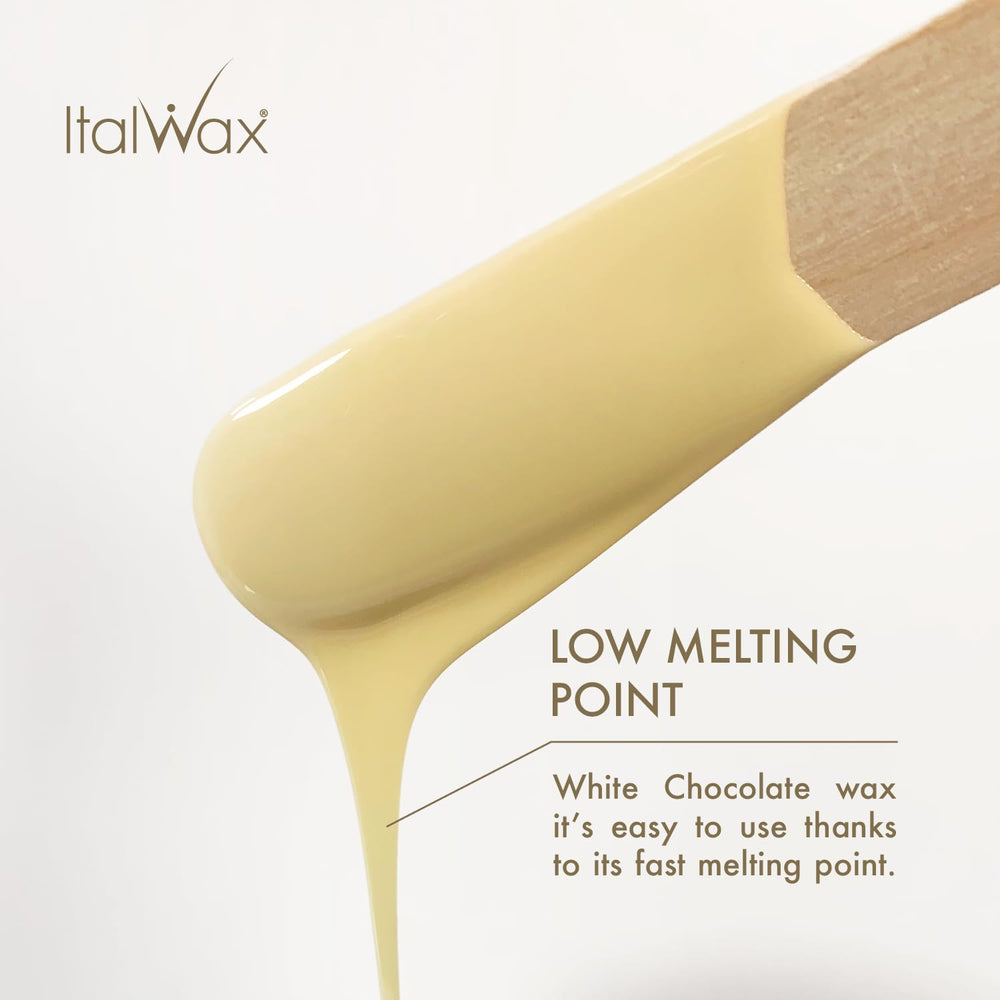 Italwax beads being applied with spatula for even direction free spreading