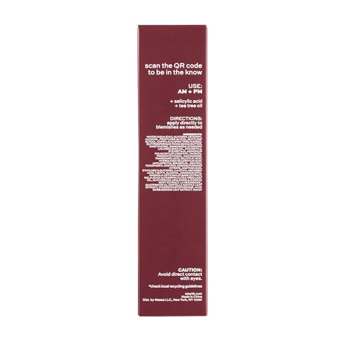 ITK Skincare spot-treatment dab applied to blemish for targeted acne care.