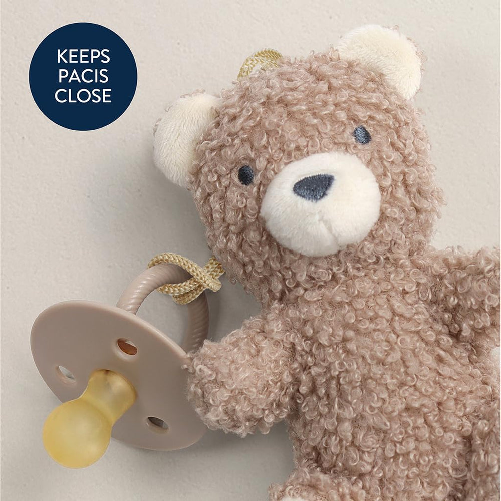 Newborn-friendly design supports tiny hands with easy-grip pacifier
