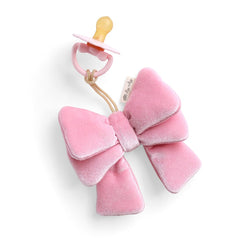 Itzy Ritzy Bitzy Pal pacifier with lovey for soothing newborns.
