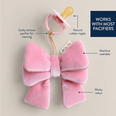 Itzy Ritzy natural rubber pacifier close-up with cherry nipple for soothing moments.