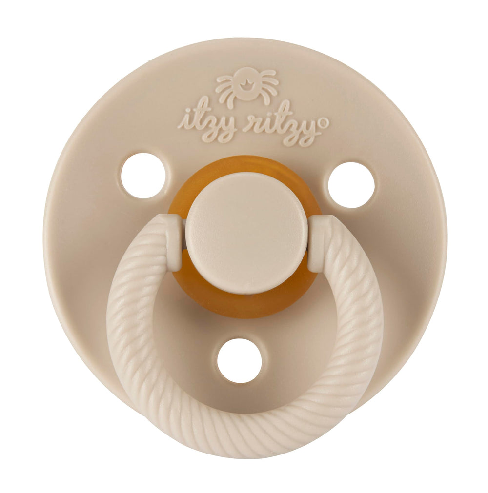 Itzy Ritzy shield with large air holes for safe breathing.