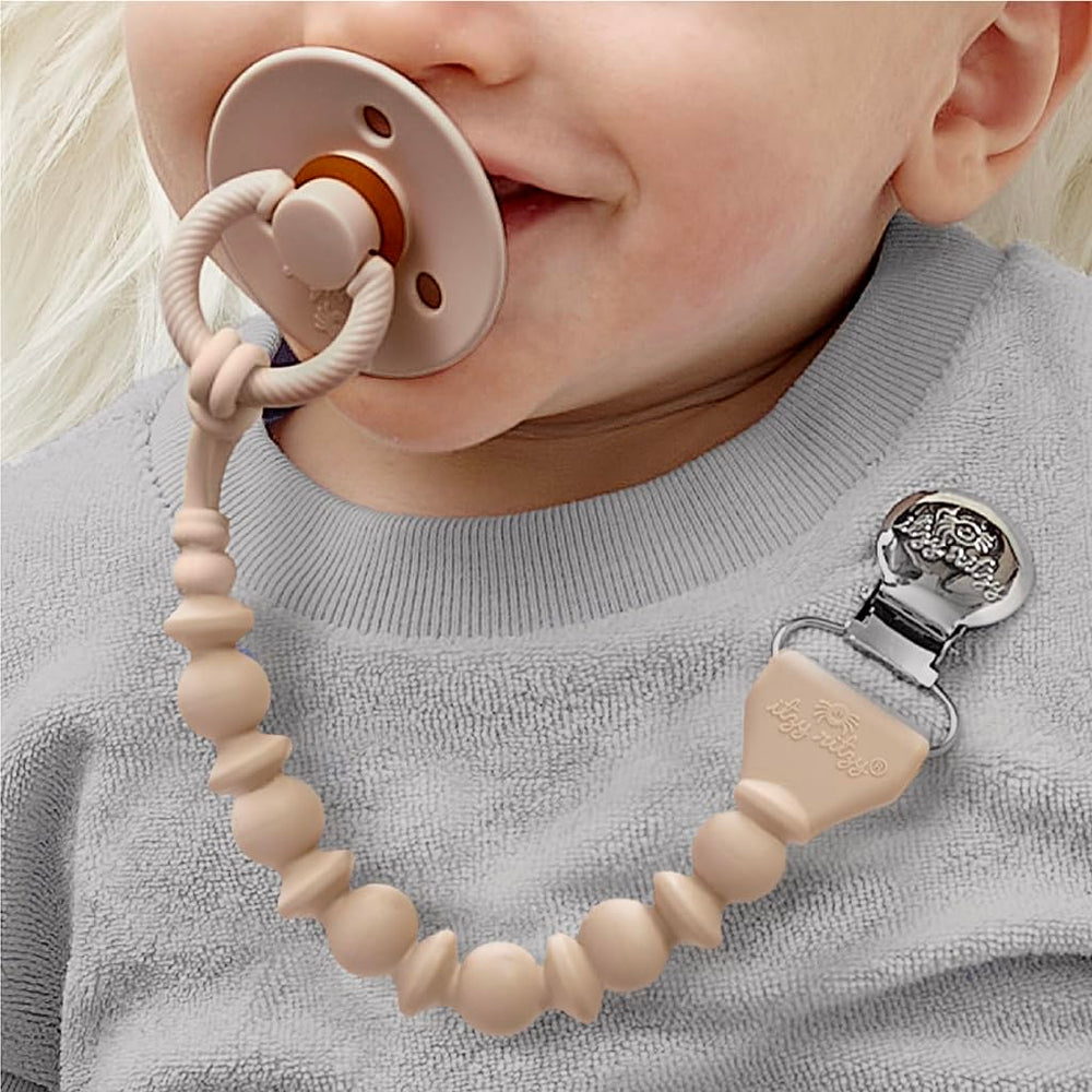 Itzy Ritzy one-piece design pacifier clip simplifies cleaning and prevents snagging on fabrics