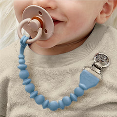 Itzy Ritzy clip features beaded detailing and secures a teether.
