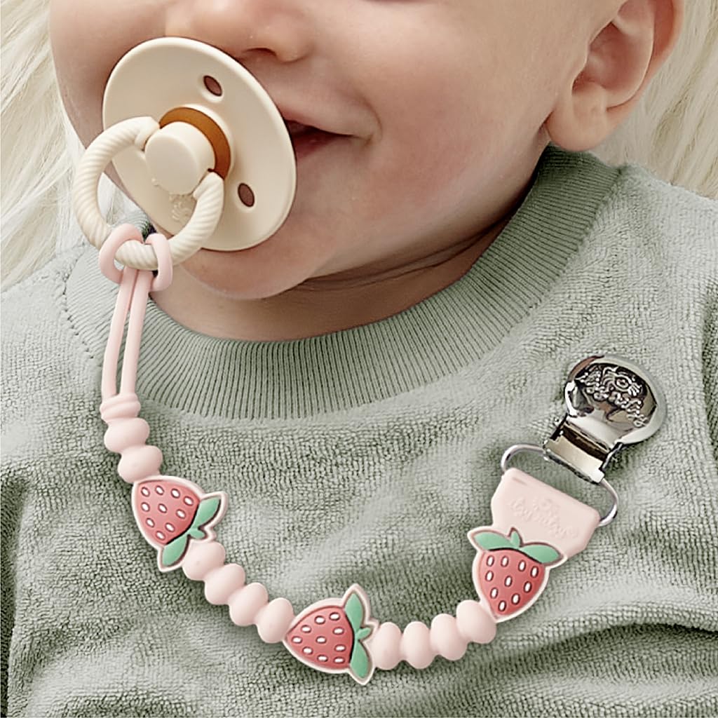 Itzy Ritzy pacifier clip close-up with strawberry character