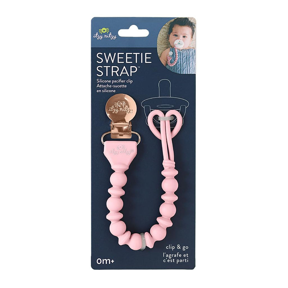 Stroller-ready Itzy Ritzy clip shown as a convenient attachment on the go.