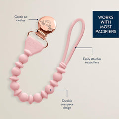 Itzy Ritzy silicone clip universal-fit for newborns and up, shown attached to a pacifier.