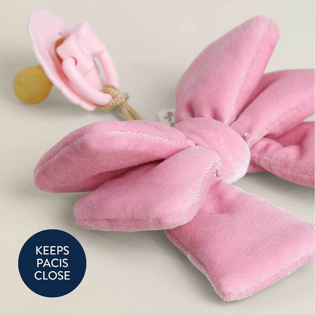 Itzy Ritzy pacifier handle with bow detail for stylish safety.
