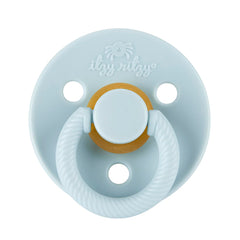 Itzy Ritzy pacifier nipple close-up showing cherry-shaped design for breastfeeding-like feel.