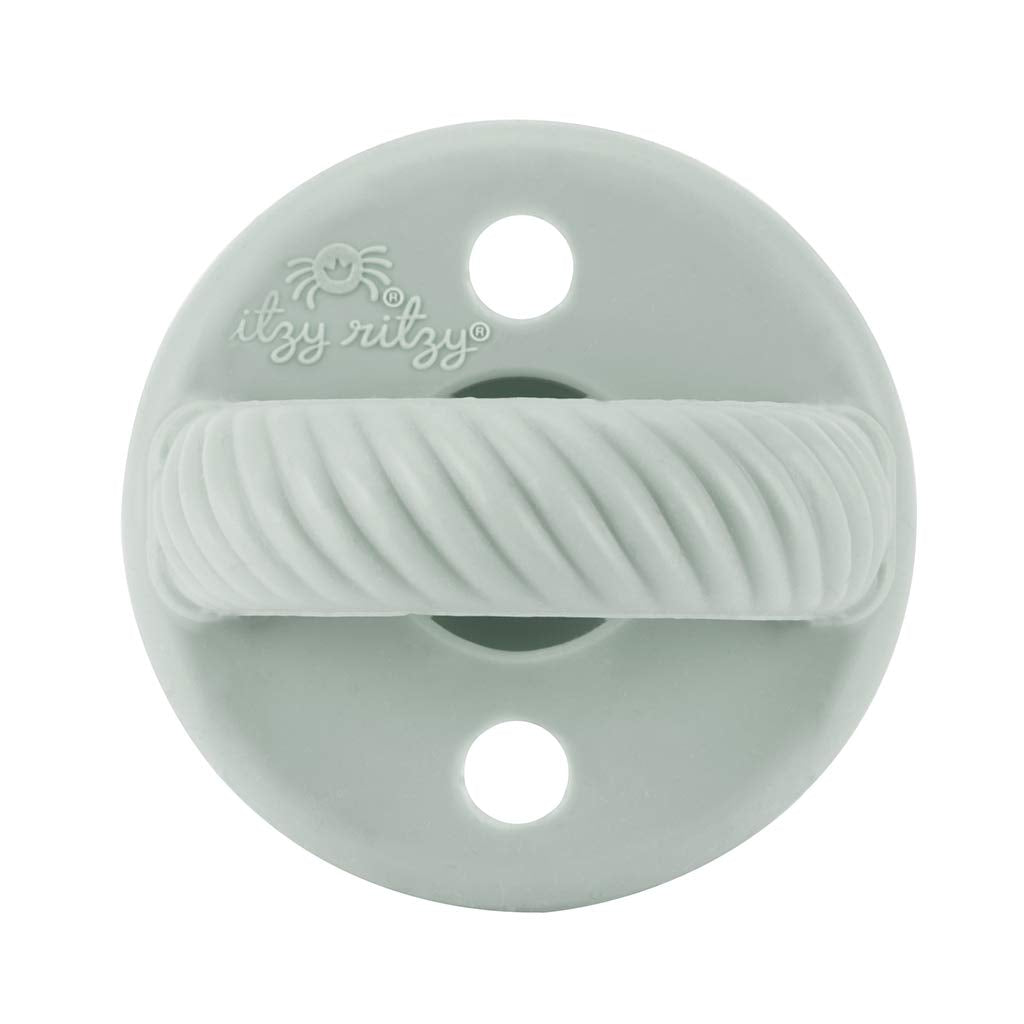 Two vent holes on Itzy Ritzy pacifier for enhanced airflow safety