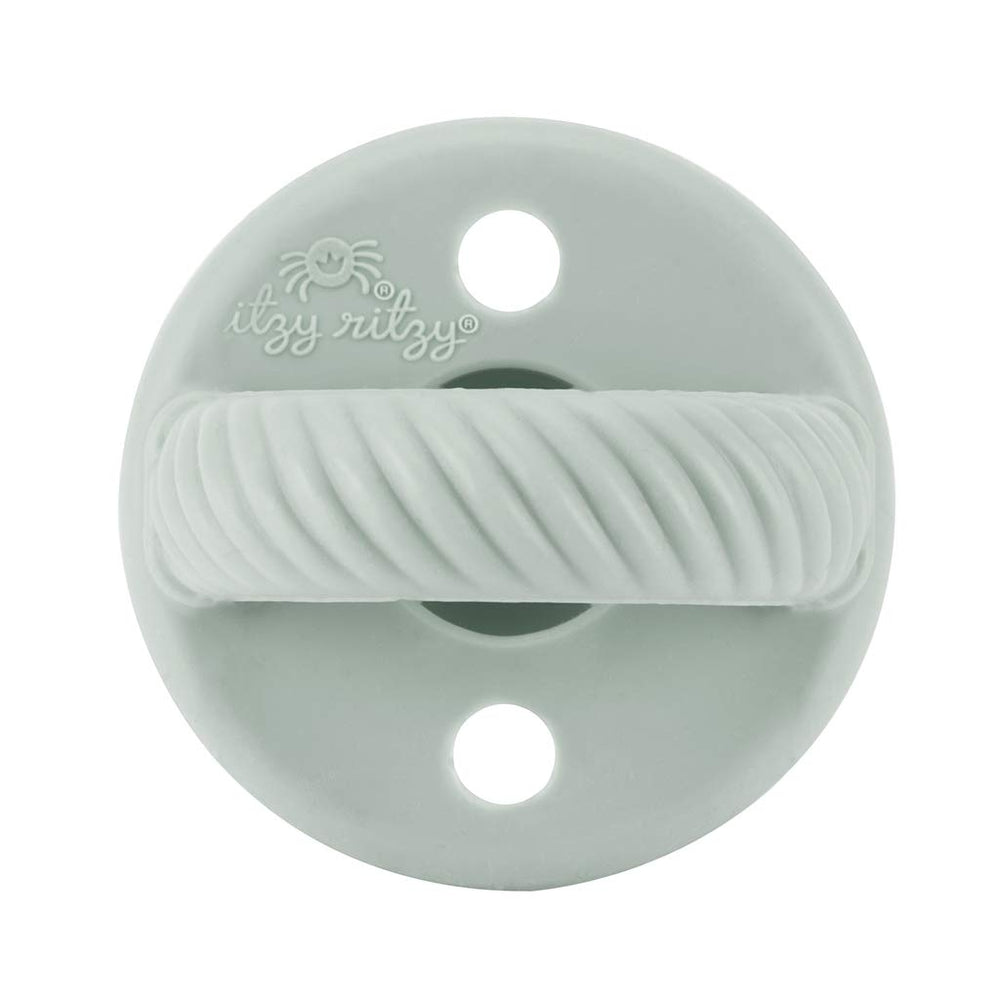 Two vent holes on Itzy Ritzy pacifier for enhanced airflow safety