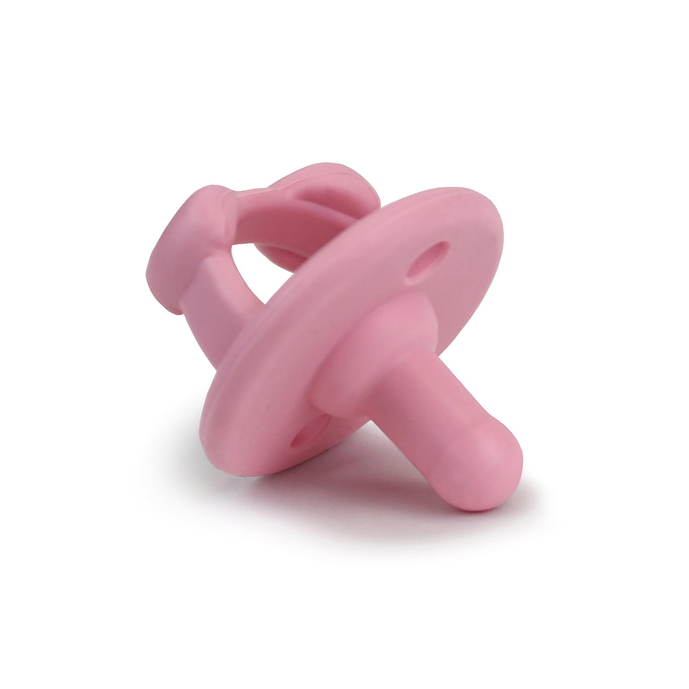 Itzy Ritzy pacifier braided handle adds cute style to baby outfits.