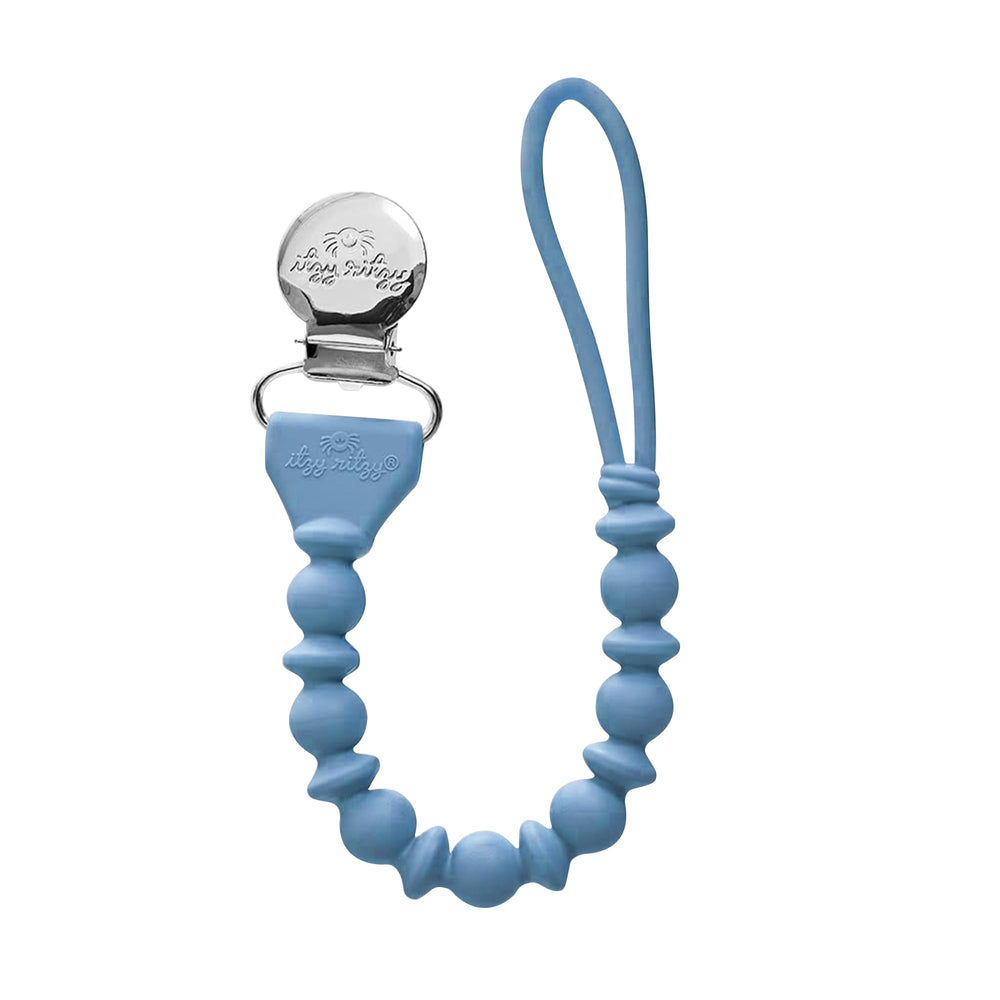 Itzy Ritzy silicone pacifier clip in blue keeps pacifier within reach for on-the-go parents.