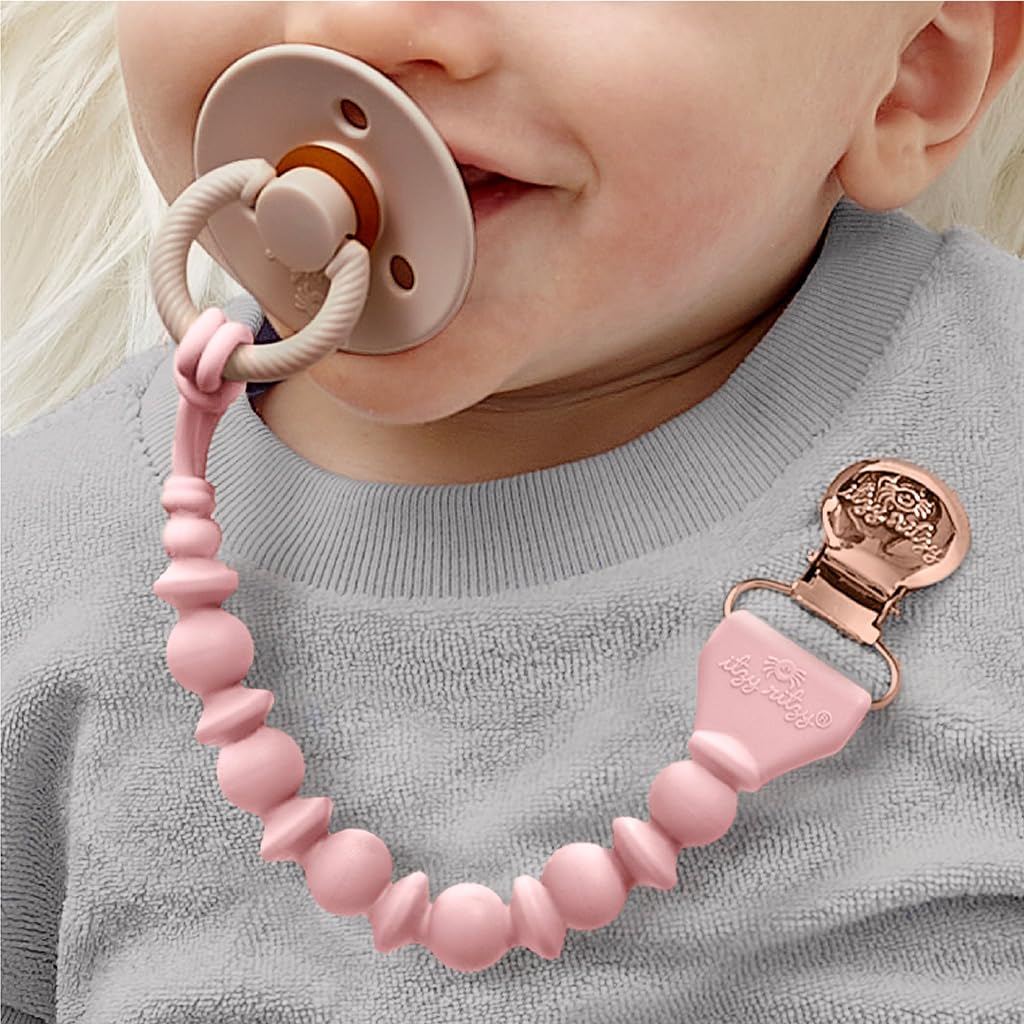Close-up of Itzy Ritzy pacifier clip secure clasp prevents loss without snagging.