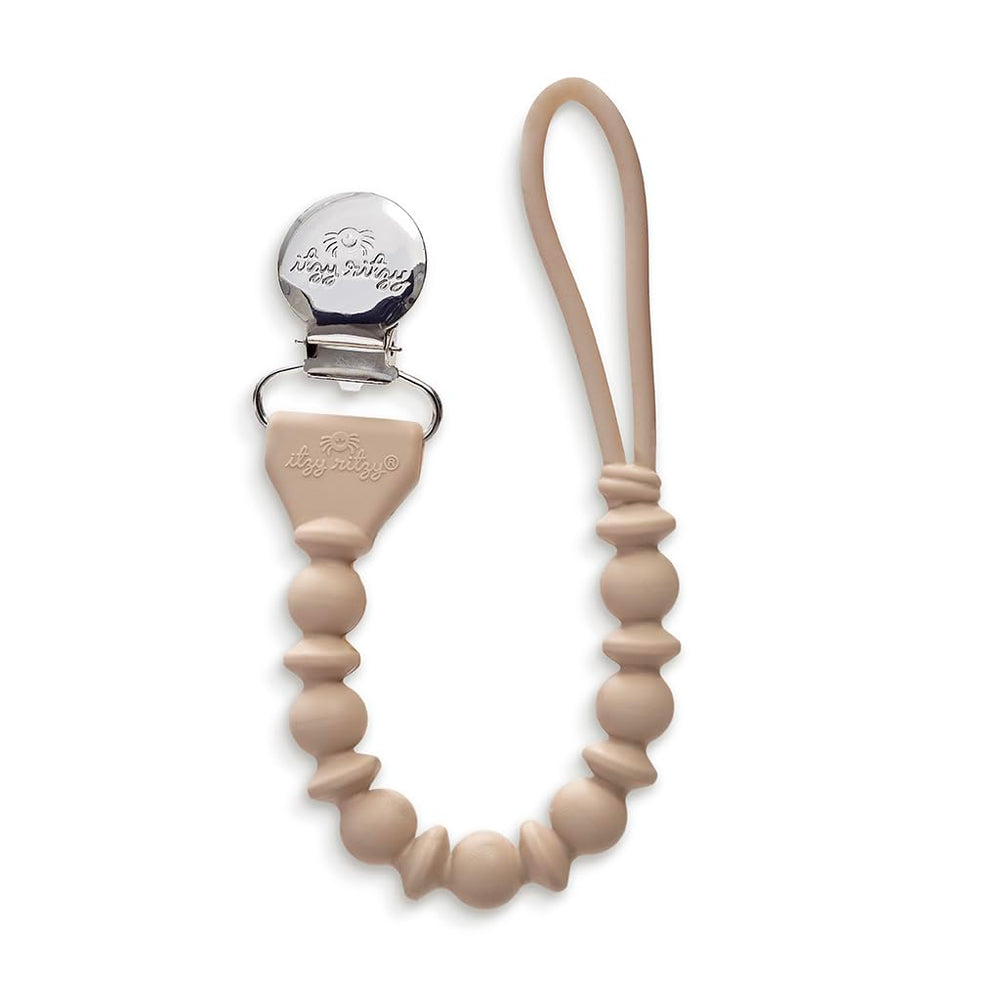 Itzy Ritzy silicone pacifier clip with beaded detail keeps pacifiers within reach for quick soothing