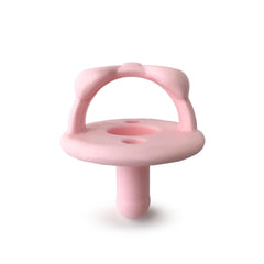 Itzy Ritzy silicone pacifier with collapsible handle in dark pink showing two air holes for safety.