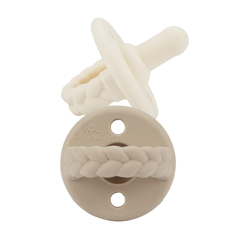 Itzy Ritzy pacifier coordinated with outfits for stylish everyday use.