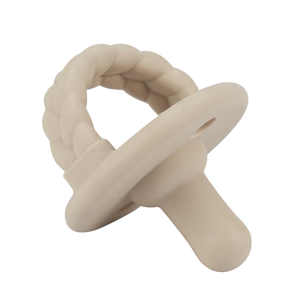 Itzy Ritzy pacifier with two large vent holes for airflow and safety.