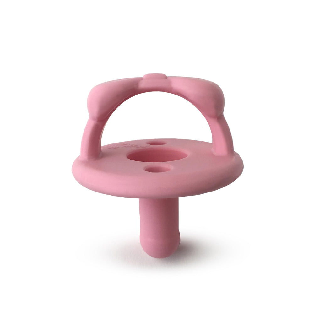 Itzy Ritzy pacifier highlighting two air holes for breathing comfort.