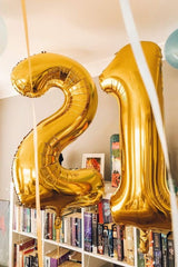 IWERP gold-foil-50-balloon adds radiant focal point to celebrations.