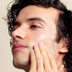 Jack Black Epic Moisture Oil on hair for shine and frizz control