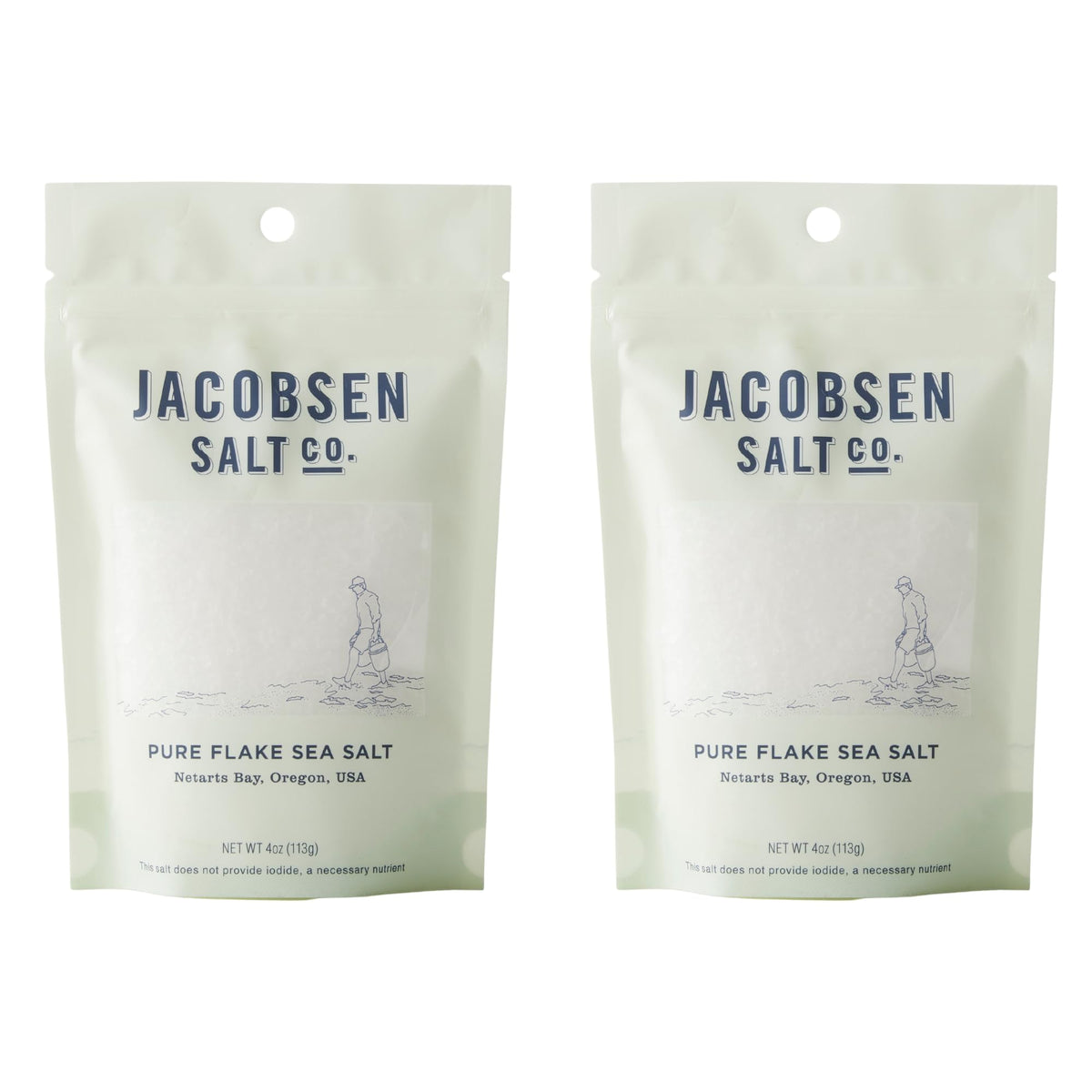 Jacobsen Salt Co. Pure Flake Sea Salt crystals finishing dish for vibrant flavors.