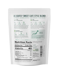Jade Leaf Matcha Organic Strawberry Latte Mix being poured into a mug for a cafe-style latte