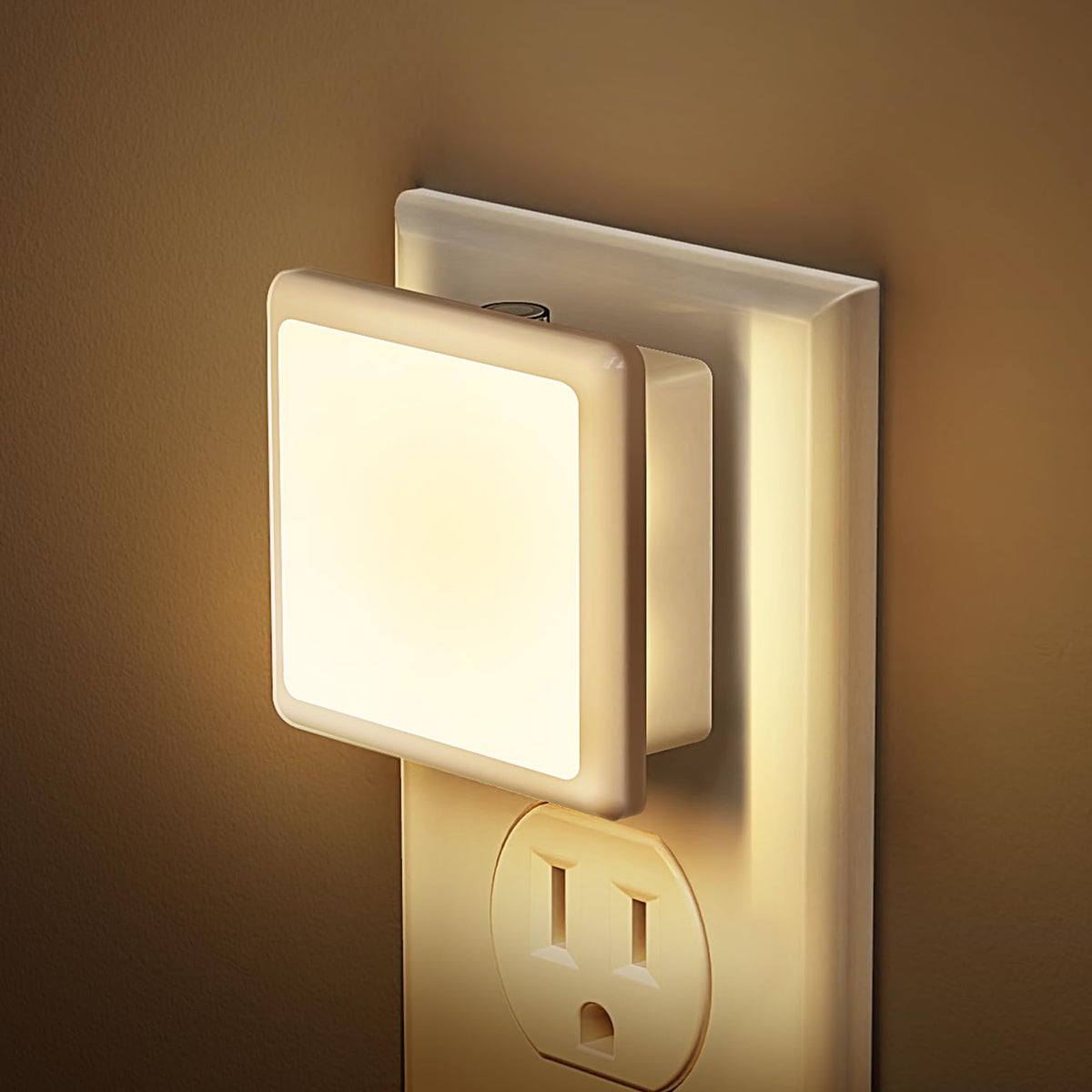 JandCase night light in outlet, two-pack, softly guiding nighttime trips.