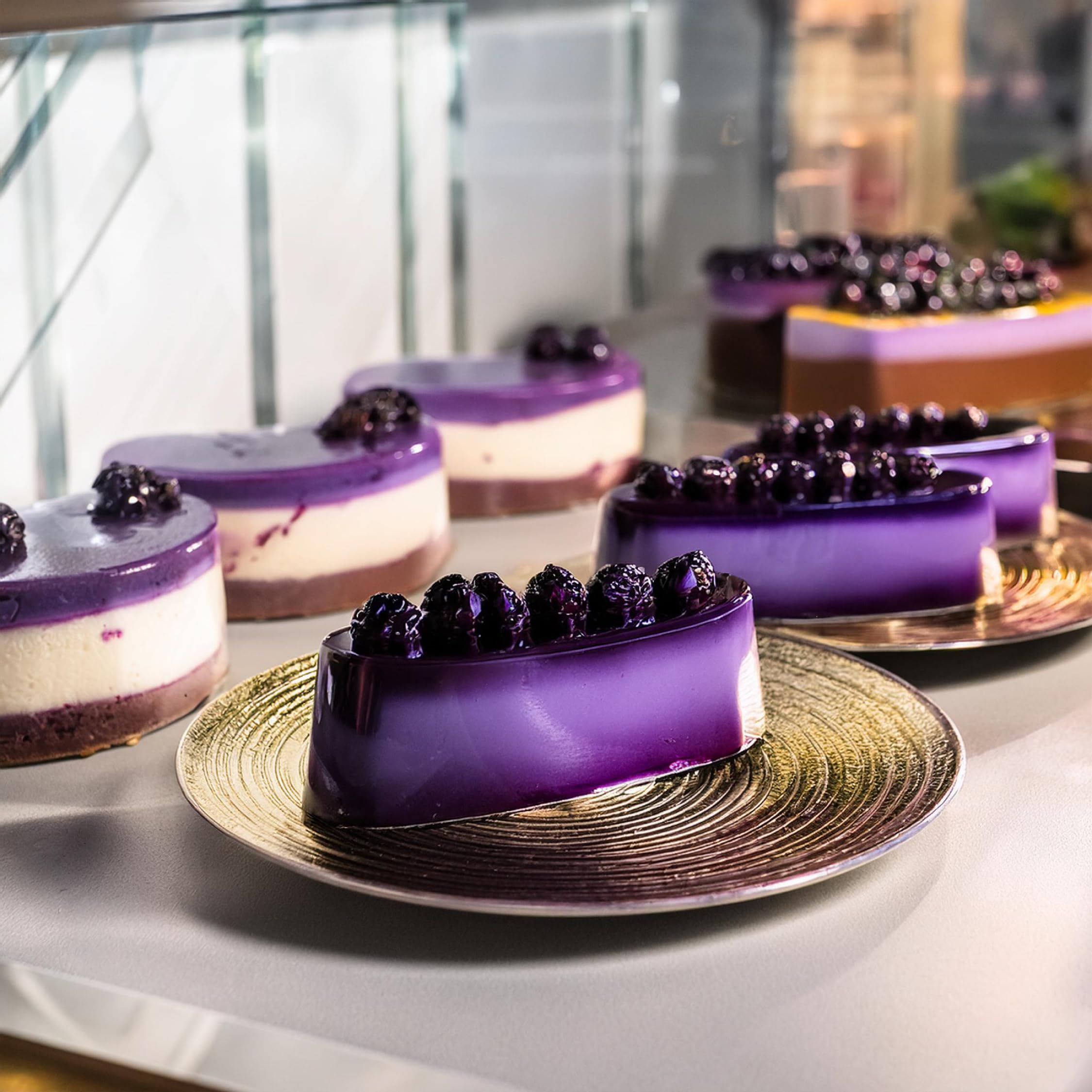 Jans Ube Condensed Milk drizzle over dessert shows vibrant color and silky texture.