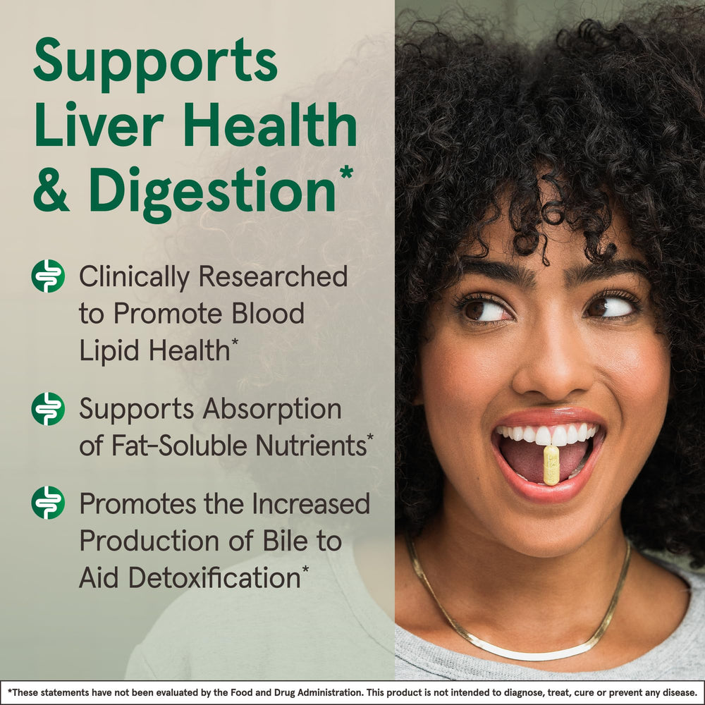 Bottle beside a glass to suggest daily liver and digestion routine.