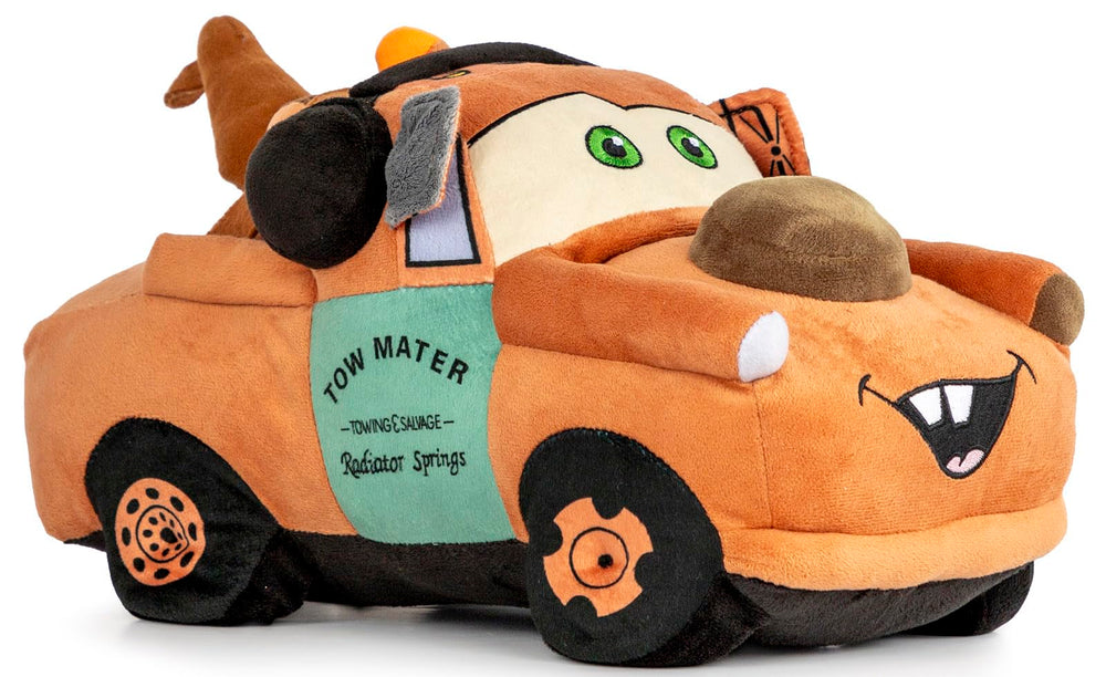 Jay Franco Tow Mater plush pillow buddy resting on a bed for cozy cuddling.