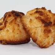 Close-up of Jennies Coconut Macaroons texture, showing chewy moist bites.