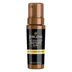 Jergens Instant Sun Mousse bottle front view showing compact self-tanner for natural bronze