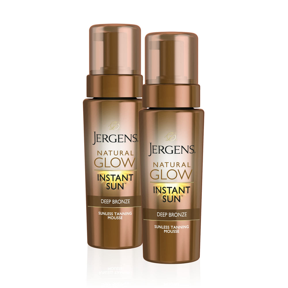Jergens Natural Glow Instant Sun Mousse bottle shows instant bronze for quick results.